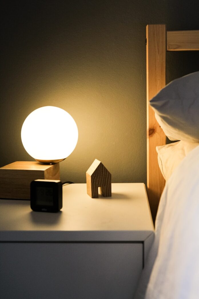 Photo by Julia black digital alarm clock at 11 00